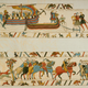 Two tapestry panels depict the army of future King Harold II of England landing in Normandy with 11 horses.